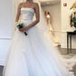 A-Line/Princess Strapless Sleeveless Tulle Sweep/Brush Train Ruffles Wedding Dresses DEP0007002